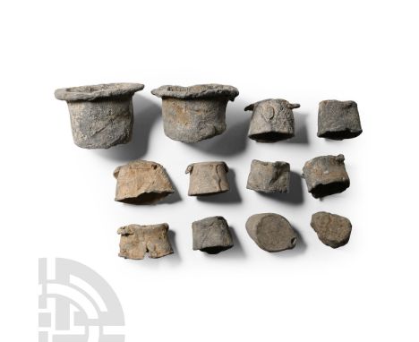 17th century A.D.. Including larger types with everted rim and smaller drum-shaped types.  331 grams total, 23-48 mm (1-1 7/8