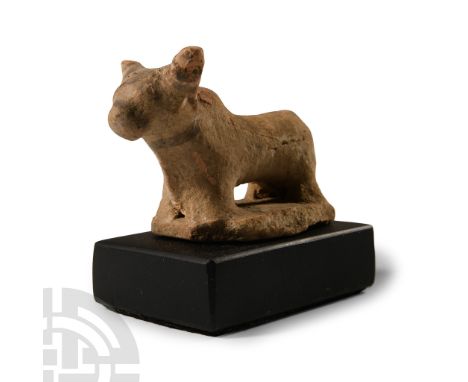 Circa 6th century B.C.. Standing on a rectangular base with head erect, painted harness detailing to the head; mounted on a c