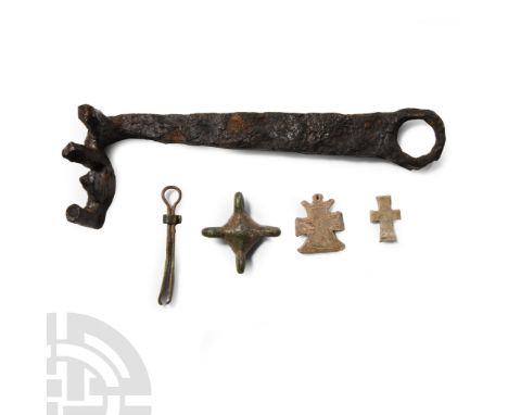 6th-11th century A.D.. Including a large iron key, a page-marker with clip, cross pendant and other items; many of these obje