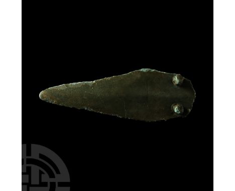 Mid 2nd millennium B.C.. Leaf-shaped blade with two cutting edges, rounded point, two sturdy attachment rivets to the shoulde
