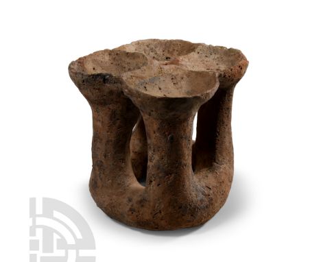 Early Bronze Age, 2300-2000 B.C.. Comprising a hollow basal ring and four vertical posts terminating in conical cups joined a