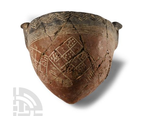 Early Cypriot I-II Period, 2300-2100 B.C.. Mammiform bowl with deep body and pointed base; two vertical concave lugs, one of 