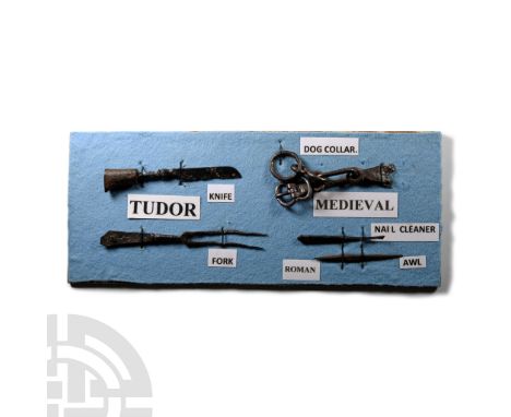 Circa 14th-16th century A.D.. Including a table knife and fork, awl, nail-cleaner and swivel-mounted collar, mounted on a fab