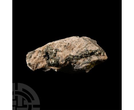 Showing some octahedral crystals, collection number 277.  26 grams, 48 mm (1 7/8 in.). Acquired on the UK mineral and fossil 