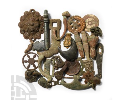 Circa 14th-19th century A.D.. Including a scabbard chape, curtain-pull, hooked fastener, belt and harness fittings and other 