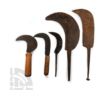 13th-17th century A.D.. Comprising four sickles and one pruning knife with crescent blade and the whittle tang handle termina