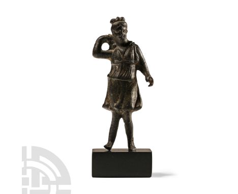 2nd-3rd century A.D.. The goddess advancing in active pose wearing a knee-length tunic gathered below her breasts, her hair t