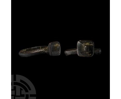 4th-6th century A.D.. Narrow D-section hoop with inverted pyramid to the bezel and knop finial. Cf. Hadjadj, R., Bagues Merov