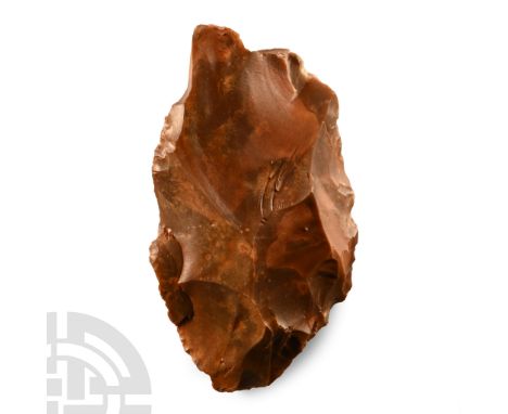 Lower Palaeolithic Period, circa 450,000-280,000 B.P.. Irregular in plan with biconvex section.  380 grams, 14 cm (5 1/2 in.)