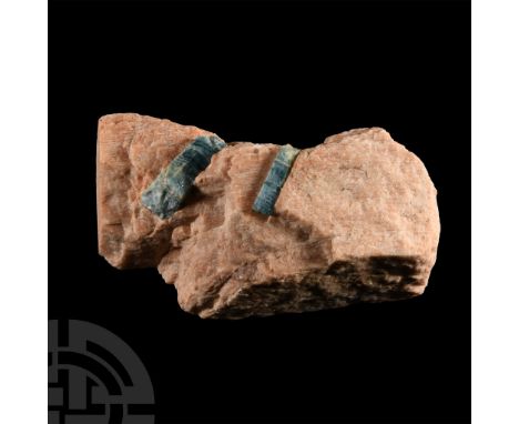 Displaying pale sapphire-blue aquamarine crystals on a pink matrix, collection number 375; accompanied by an old James Walker