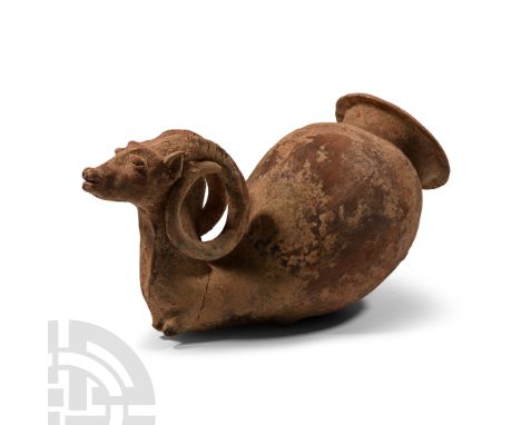 20th century A.D.. With trumpet-shaped mouth and barrel-shaped body, ibex-shaped finial with coiled horns and legs folded ben