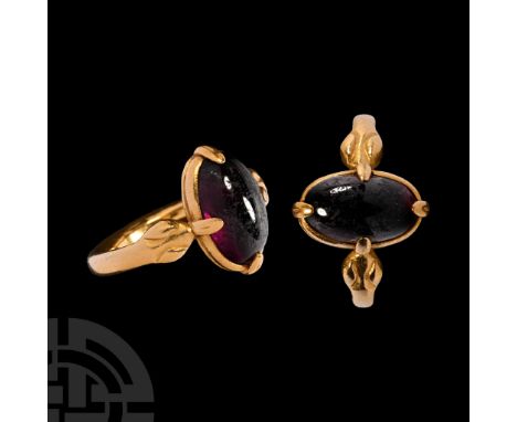 16th-17th century A.D. or later. Each shoulder a serpent-head supporting an ellipsoid bezel with amethyst cabochon in claw se
