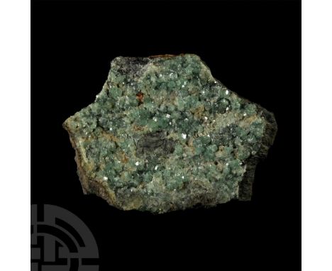 With apple-green and greenish white crystals, the calcium has been replaced by traces of chromic acid, collection number 461.