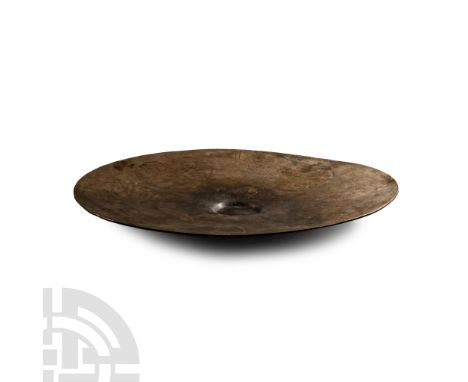 3rd-6th century A.D. or earlier. A finely hammered bowl, the surface punched with vegetal and zoomorphic decoration comprisin