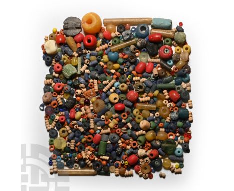 1st millennium B.C. and later. Comprising beads in various materials including ceramic, lapis lazuli, glass, and stone.  61 g