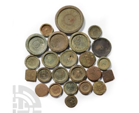 17th-20th century A.D.. Including square and round coin and trade weights, many with stamps and other markings; many of these