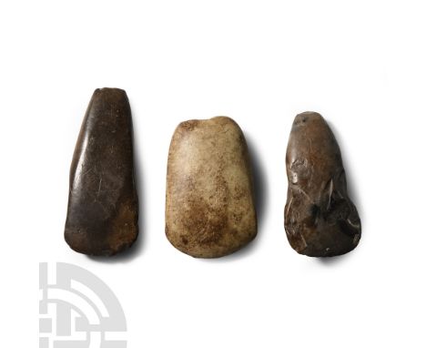 Neolithic Period, circa 4th-3rd millennium B.C.. Comprising one trapezoidal in profile with square butt, one similar with wai