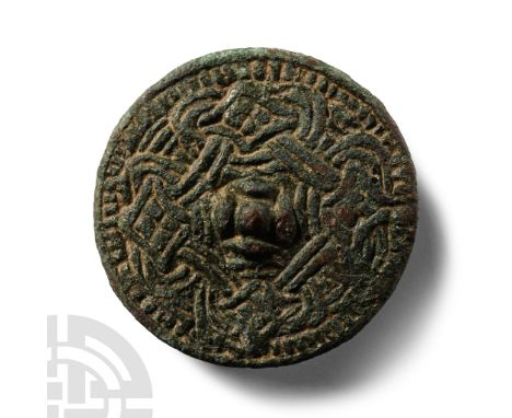 11th century A.D.. With low-relief Borre style looped tendrils motif, lug and catch to the reverse. Cf. Hattatt, R., Ancient 