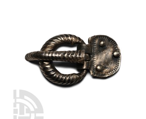 6th-7th century A.D. or later. Comprising: graduated loop with twist detailing; conical tongue with similar twist detailing, 