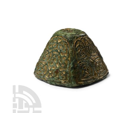 8th-9th century A.D.. Hollow-formed pyramidal mount with dense Insular Style knotwork design in low relief. See Menghin, W., 