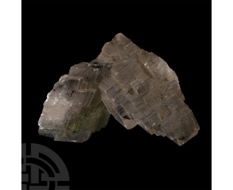 Exhibiting stepped rhombohedral crystals, collection number 594, with an old Gregory, Bottley &amp; Lloyd label.  250 grams, 