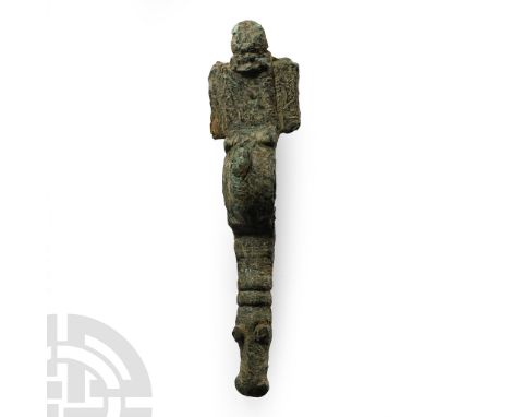 Later 5th-6th century A.D.. With trapezoidal headplate and lateral wings, domed stud above, deep bow and equine finial; ferro