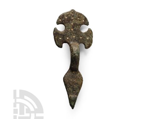 Later 5th-6th century A.D.. With trefoil head and leaf-shaped foot, ring--and-dot ornament. Cf. MacGregor, A. &amp; Bolick, E