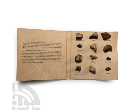 In a card folder with a short information text and twelve labelled mineral specimens: limestone, marl, sandstone, flagstone, 