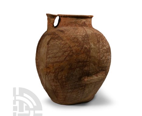 Bronze Age, 3rd millennium B.C.. Biconvex globular body with broad neck, everted rim, two ledge handles below the equator, ba