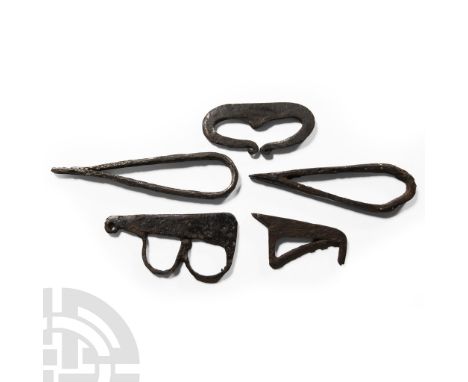 Circa 14th-16th century A.D.. Comprising four examples with curved handles. Cf. similar specimen in PAS, PUBLIC-1CC6C6. 170 g