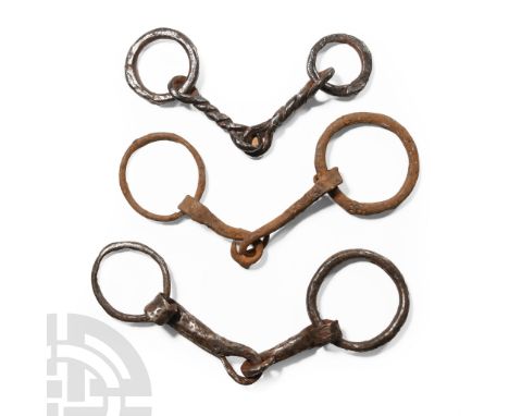 14th-16th century A.D.. Snaffle bits with linked-ring joints, curb-bit ring to each end; many of these objects are published 