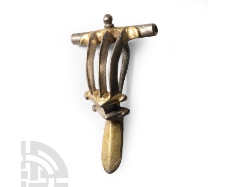 2nd century A.D.. P-shaped bow brooch with crossbar and knop above, bow in three parallel bars, triangular-section waisted fo