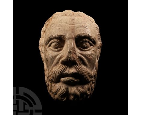 Late 12th-13th century A.D.. Carved naturalistically in the round as a mature male figure with short wavy hair, full beard an