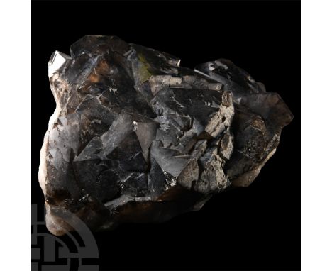A very large specimen displaying very dark crystals.  5.6 kg, 20 cm (7 7/8 in.). Acquired on the UK mineral and fossil market