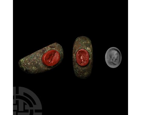 2nd century A.D.. With inset jasper gemstone, intaglio profile bust of Sol with radiate crown; supplied with a museum-quality
