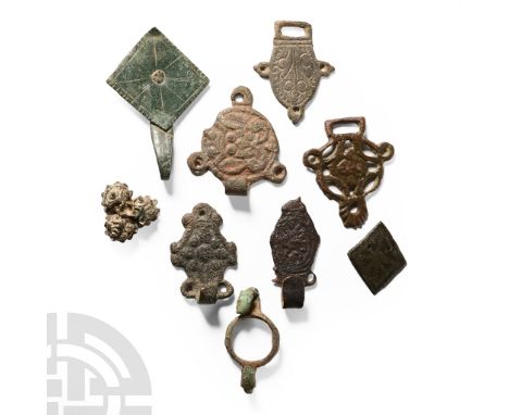 14th-16th century A.D.. Including hooked tags, trefoil rosette hooks, slotted tags and other items; many of these objects are