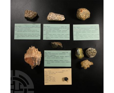 Comprising: pyrite from Italy on a granite stand; granite from Middlesex, England, collection number 534; halite(?), no colle