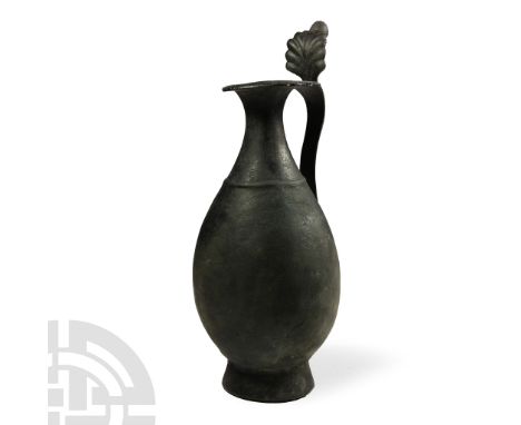 3rd century A.D.. Piriform in profile with a flared foot and raised collar at the shoulder, everted rim to the mouth with cre