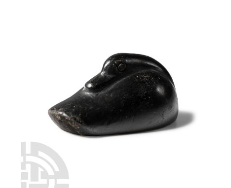 7th-6th century B.C.. Modelled in the round with the head resting along the spine. Cf. Kozloff, A.P., Animals in Ancient Art,