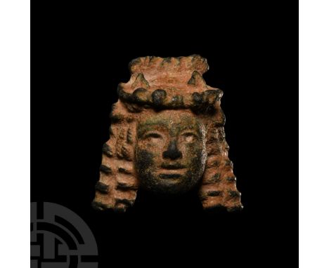 2nd century B.C.-1st century A.D.. With rounded fleshy face and hair in tiered bands, sockets to the eyes to accept silver in
