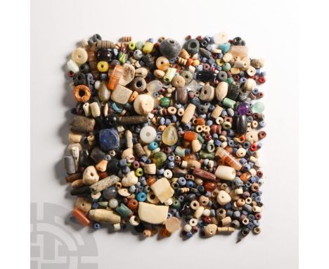 1st millennium B.C. and later. Comprising a quantity of mixed beads in lapis lazuli, shell, carnelian, agate, glass, ceramic 