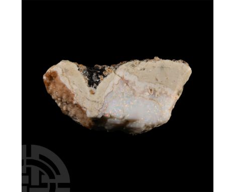 A milk-opal variety displaying iridescent white colour; purchased for £65.00 from Gregory, Bottley &amp; Lloyd, in the 1980s,