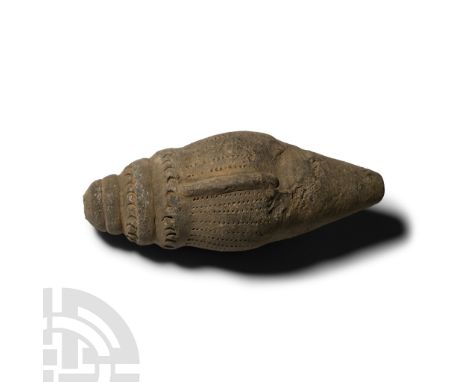 13th-15th century A.D.. A hollow vessel with cylindrical body, short neck and domed mouth, four raised lugs to the body, band