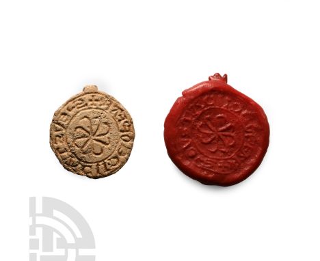 12th-13th century A.D.. Discoid in shape with central eight-petalled flower within a roundel, surrounding '+ S’ EVSTACII DE O