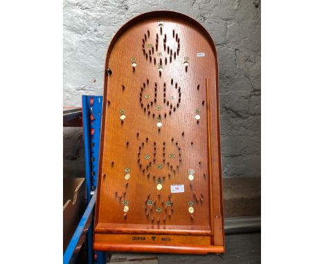 A wooden bagatelle 