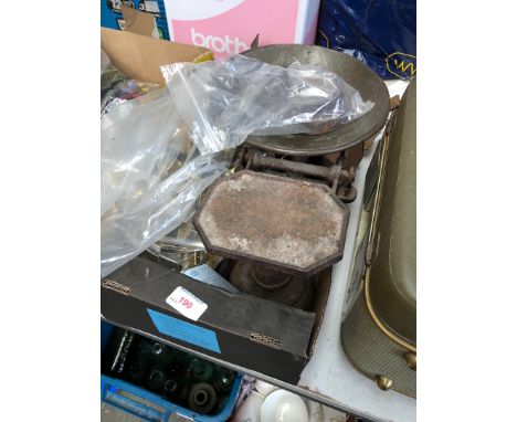 A box containing weighing scales, brass door handles, etc 