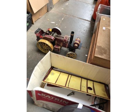 A box containing a model traction engine 