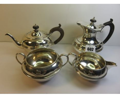 EDWARDIAN SILVER TEA SERVICE, 4 piece HM silver spherical design tea service by "Carrington", applied lamb crest and motto, L