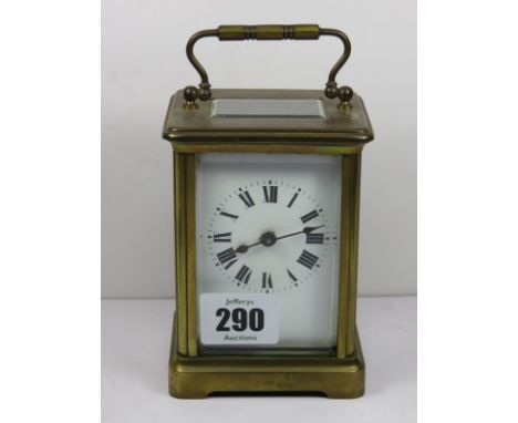 CARRIAGE CLOCK, a glass cased bevelled glass carriage clock with 2 keys