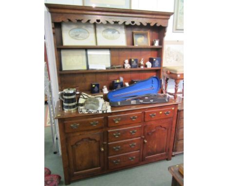 OAK DRESSER, quality oak reproduction cupboard and drawer base dresser, open shelf back with fretwork crest, 60" width